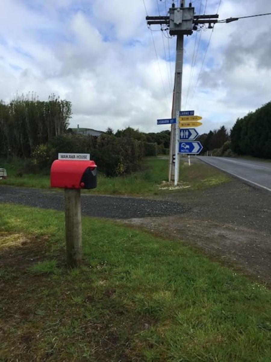 Look for the red mail box "Waikawa House" to locate the driveway